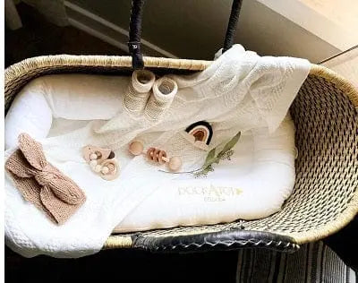 Mama Zuri Style Bolga Baby Baskets Remarkable handmade straw baby basket